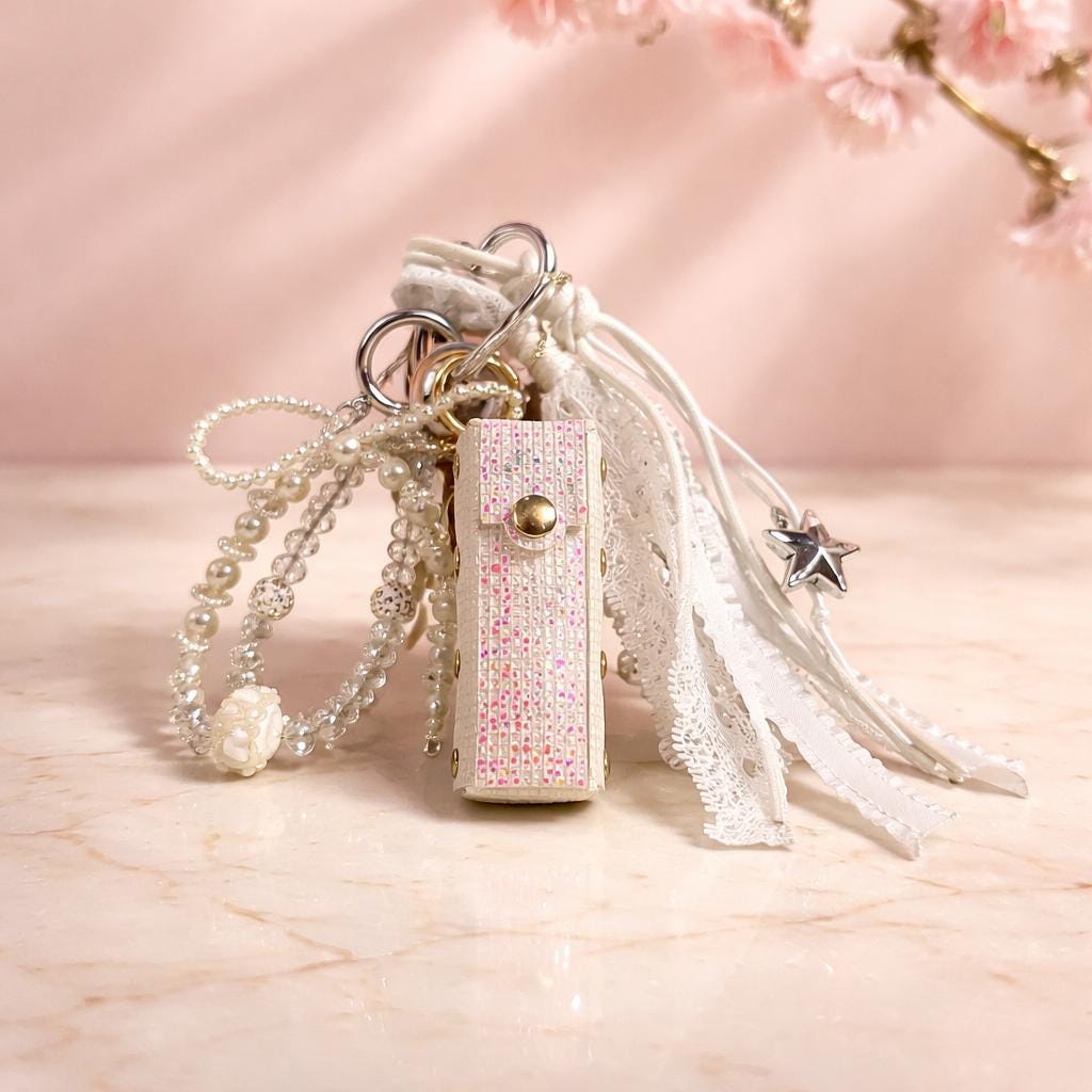 Glam Lipstick Holder Bag Charm Keychain with Pearls, Ribbon & Star Charm Main image
