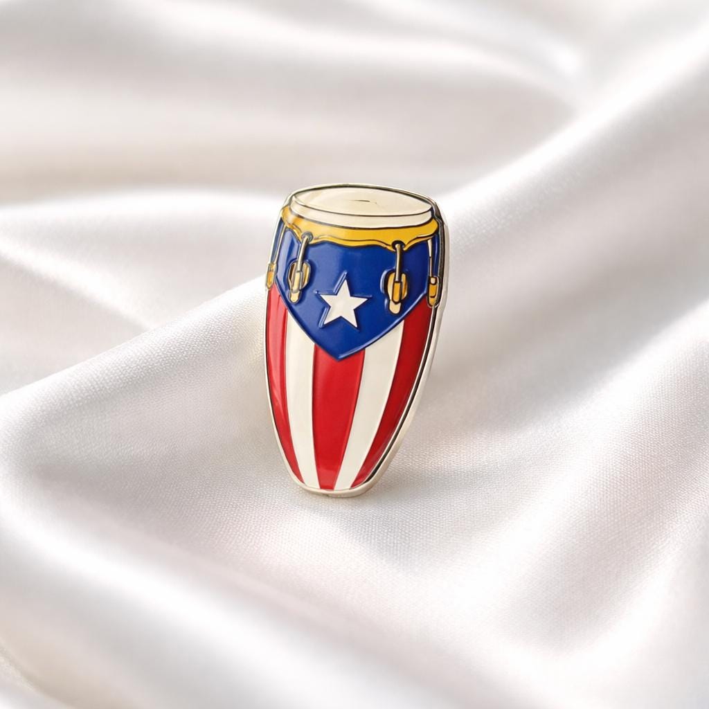 Decorative drum with Puerto Rican flag design on a white fabric background Main image